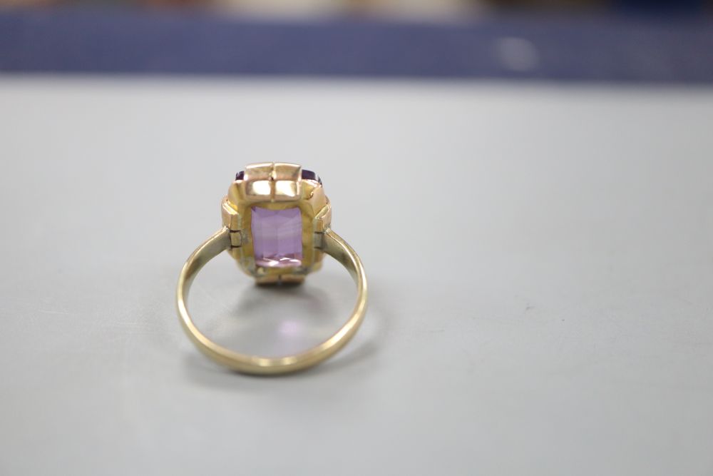 A 9ct gold and amethyst set dress ring, size K, gross 4.2 grams.